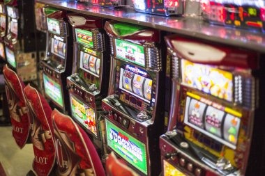 Galactic Gems slot game interface with gem symbols and reels